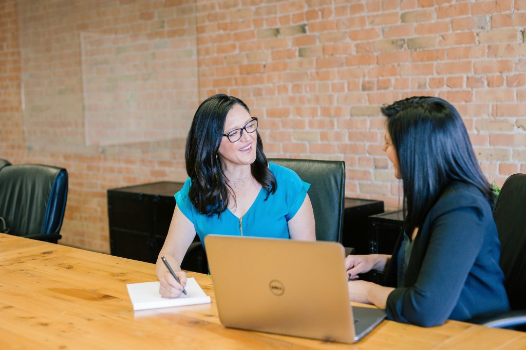 women meeting for a ghostwriting project